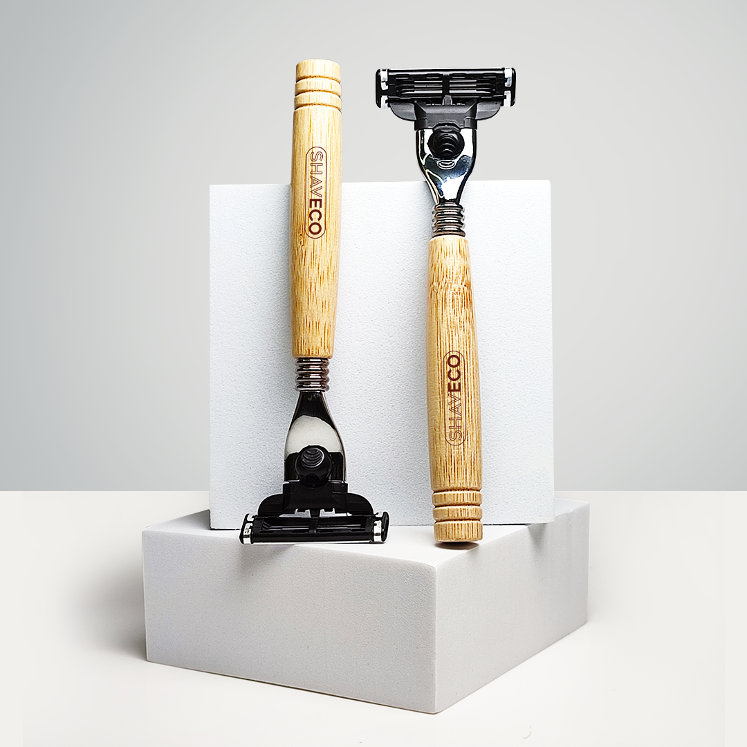 2 Bamboo Edge 3 Razors with 1 placed upside down. The background is simple and white.