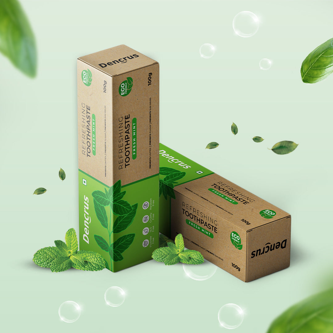 Packaging of 2 mint flavored toothpaste placed in a dynamic, angled layout.