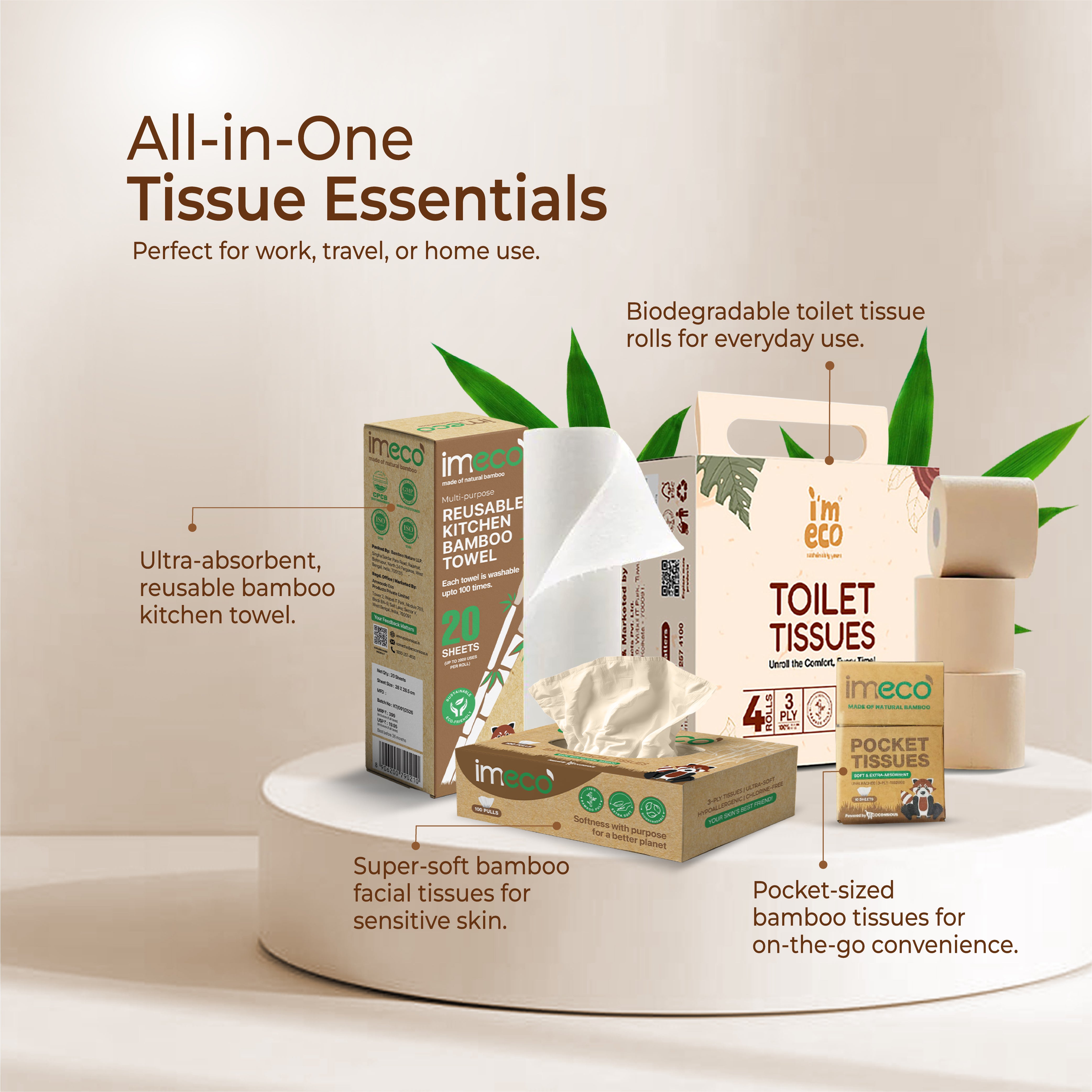 collection of imeco tissue products on a white surface with green leaves.