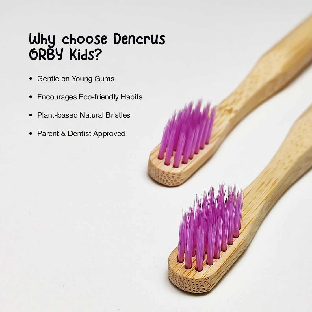 Close up shot of two ORBY Kids lavender bristles against a white background highlighting the key features