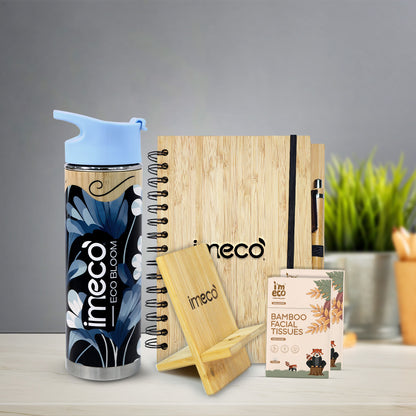imeco desk essentials including bamboo bottle, bamboo pen stand, bamboo pocket tissues, and bamboo diary with a pen against a blurred background