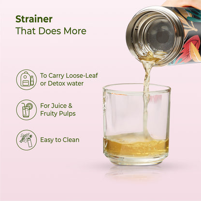 imeco eco bloom bamboo water bottle with a strainer pouring drink on a glass with features mentioned against a light background