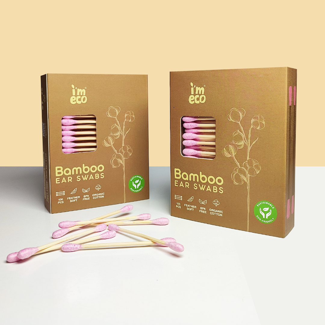 Two packaging of IMECO Bamboo Cotton Ear Swabs with several pink swabs placed on the outside against a light background