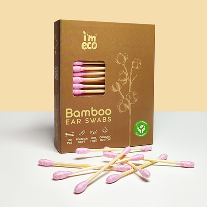 Packaging of IMECO Bamboo Cotton Ear Swabs with several pink swabs placed in on the outside against a light background 