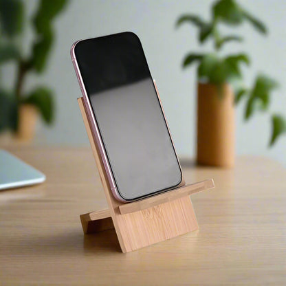 IMECO Bamboo Mobile Stand where a mobile is there on the stand against a blurry interior background 
