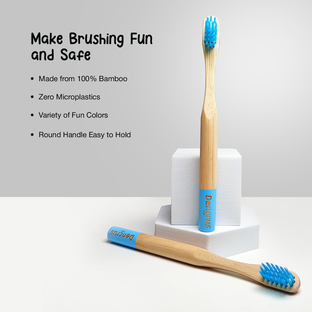An image of two ORBY Kids blue toothbrush. One is standing against two white blocks and the other one is is placed on a white surface. In the background there are USPs and benefits are mentioned. 